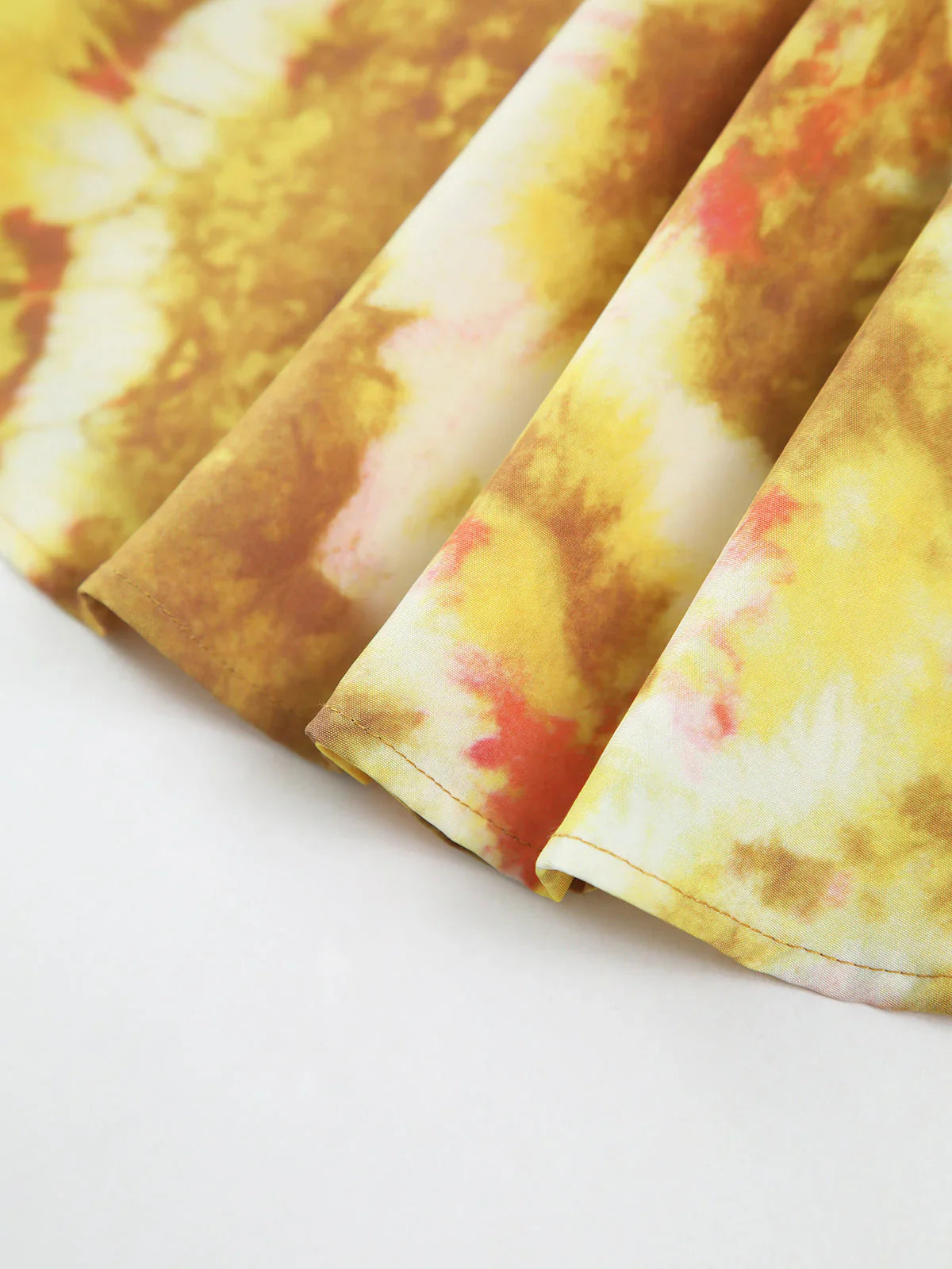 Skylar – Miniabito luminoso allacciato al collo