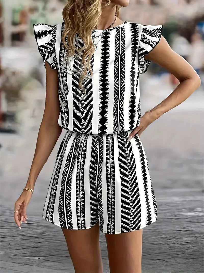 Tara – Tuta alla moda con maniche a cappuccio