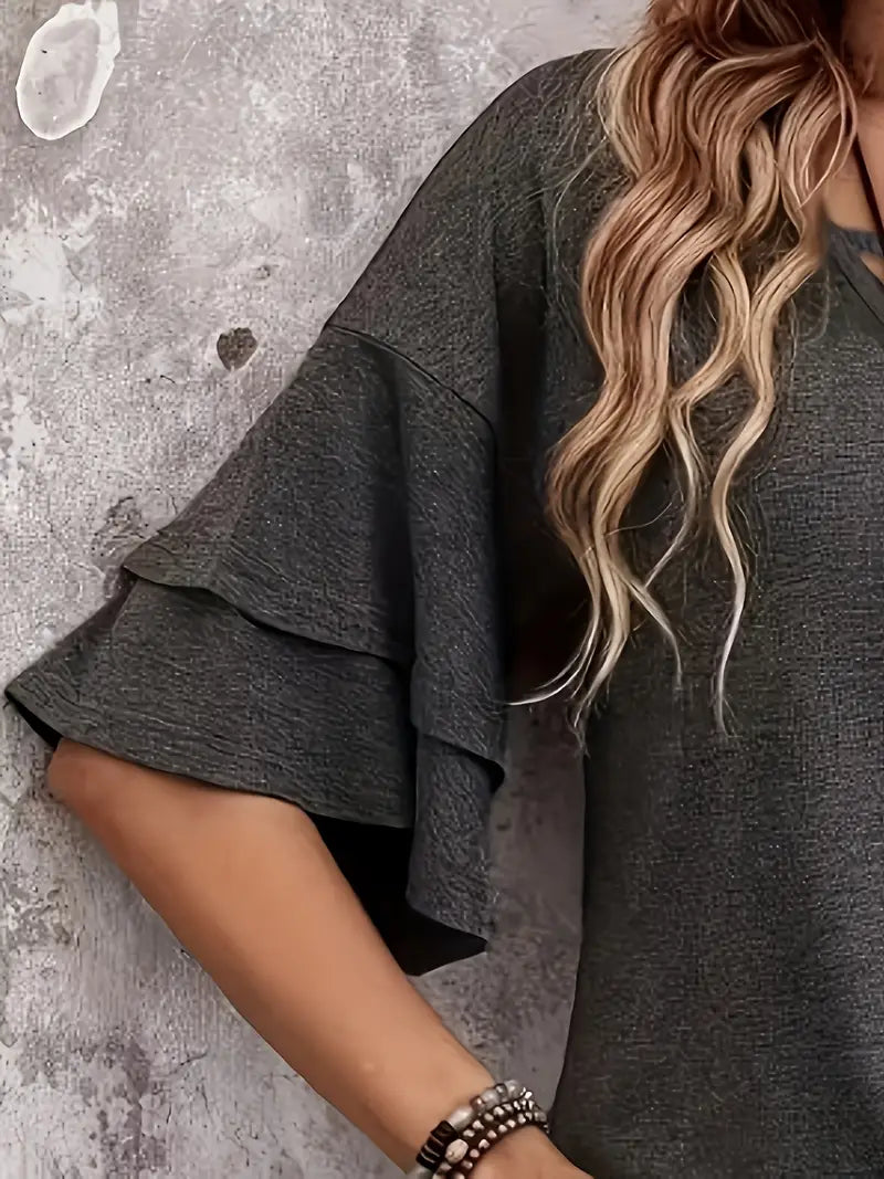 Hesperia – Elegante top con maniche a volant