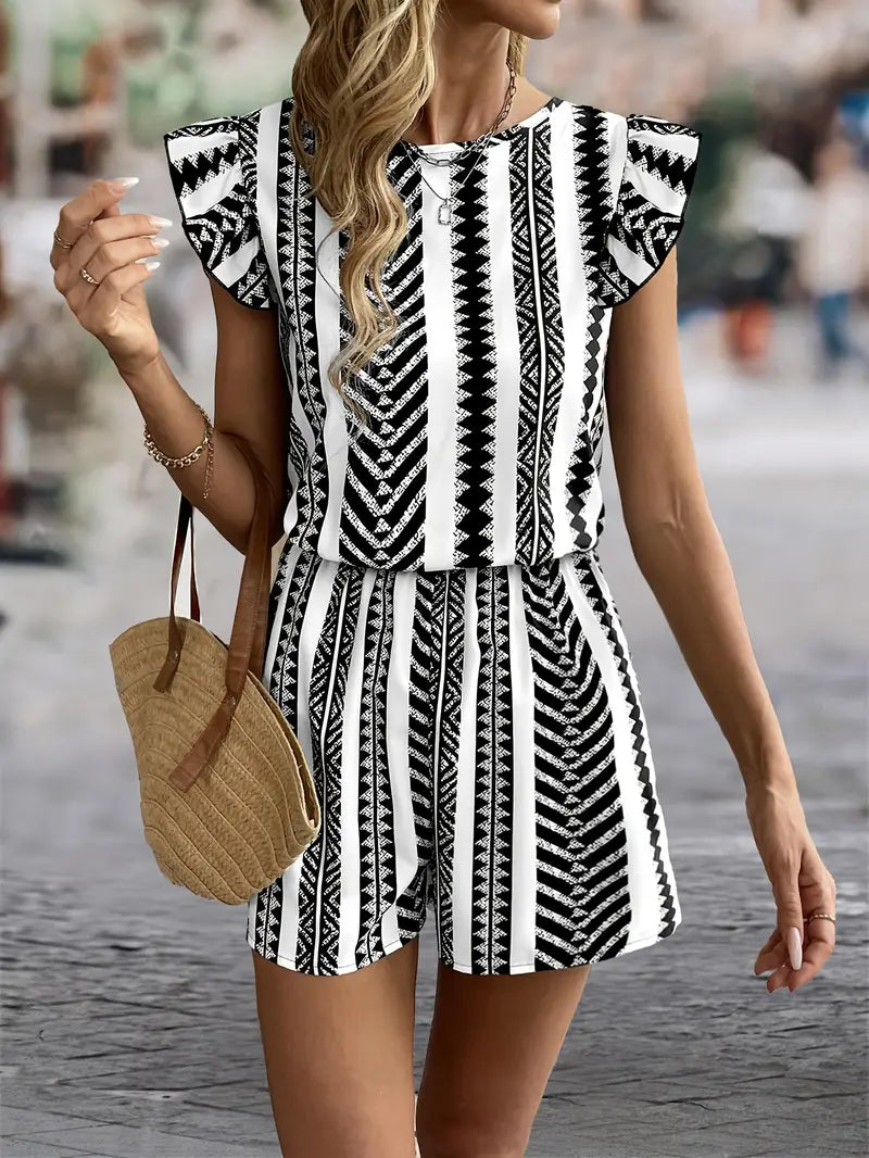 Millicent – Tuta elegante con schiena scoperta