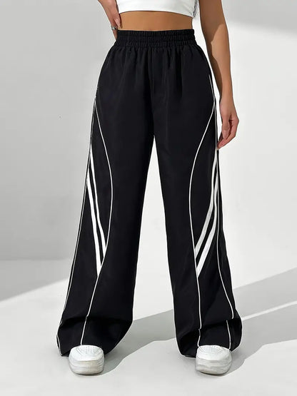 Phet – Pantaloni sportivi da allenamento a gamba larga