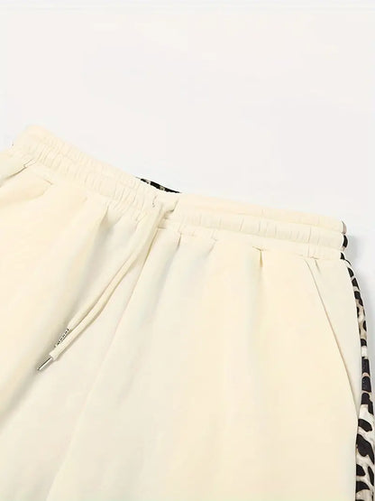 Minakshi – Joggers in cotone con stampa leopardata