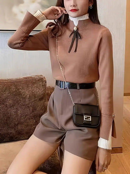 Quinn – Top elegante in cotone con colletto a volant