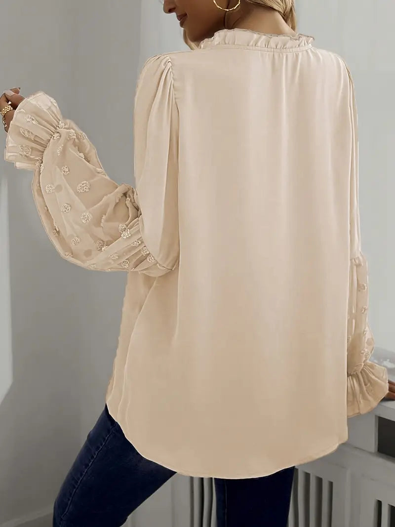 Nemirra – Elegante camicetta semitrasparente con bordi a volant