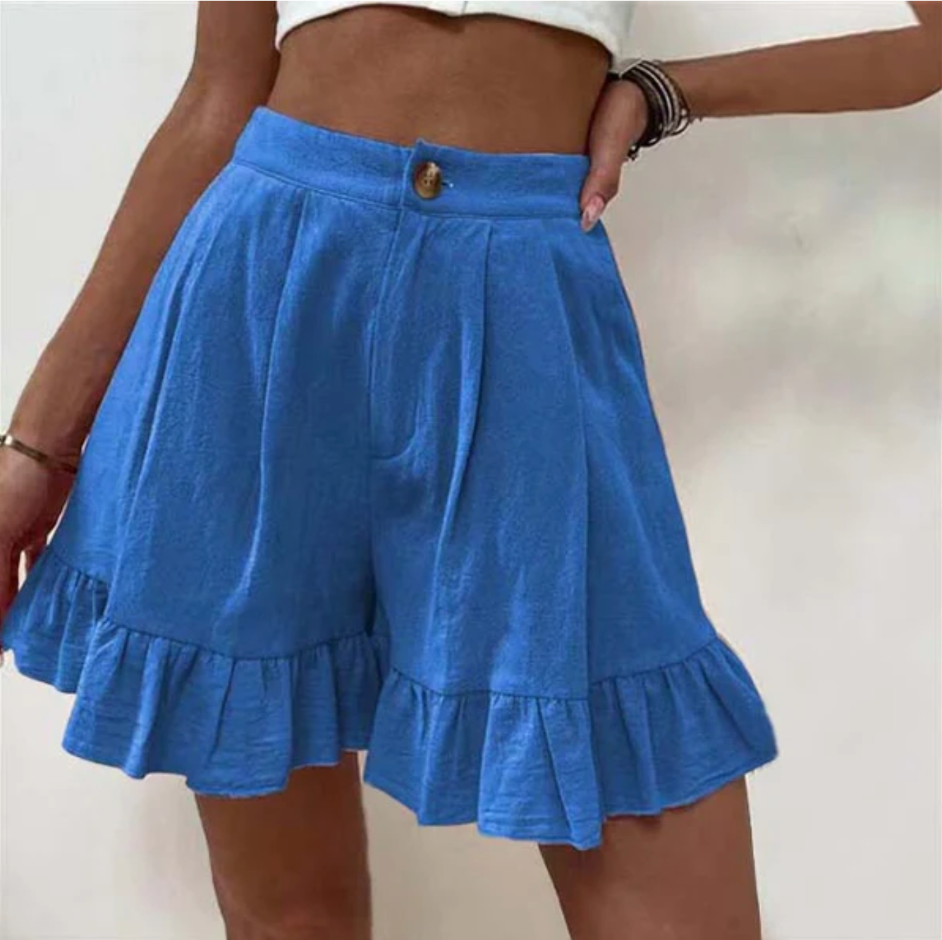 Thalara – Pantaloncini chic con orlo volant