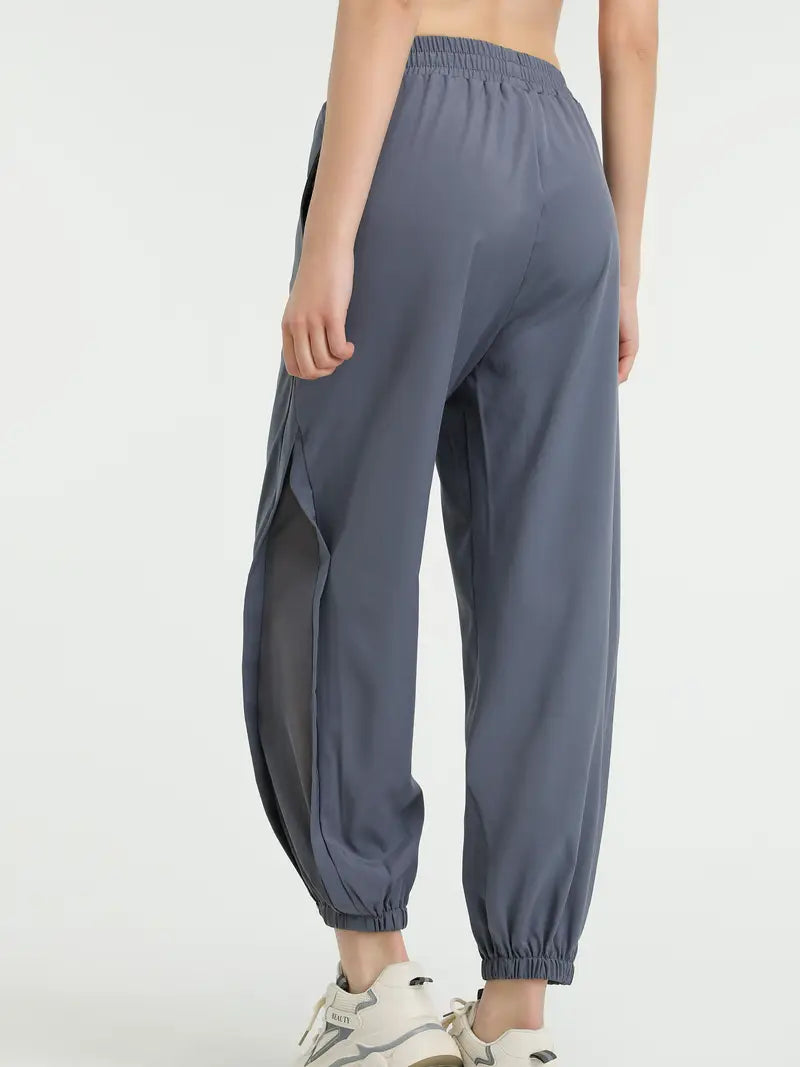 Hexaria – Pantaloni da jogging alla moda con dettagli in rete