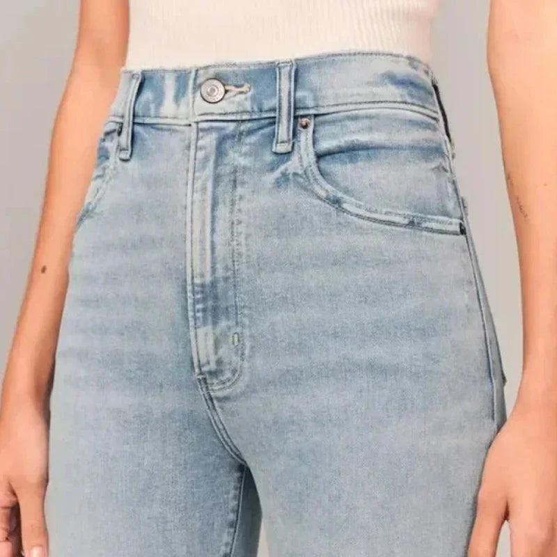 Indirae – Pantaloni svasati a vita alta in cotone elasticizzato