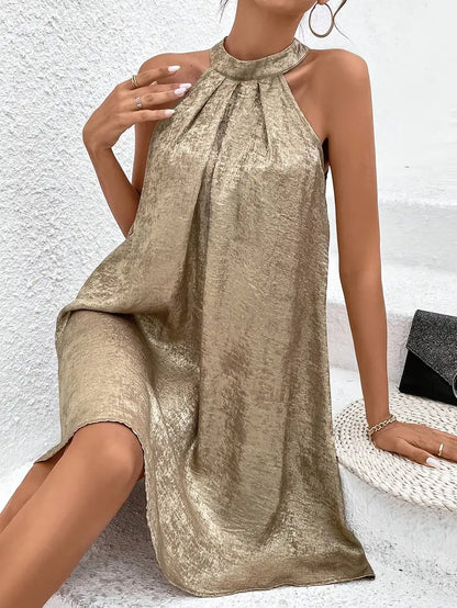 Lue – Elegante abito allacciato al collo in oro