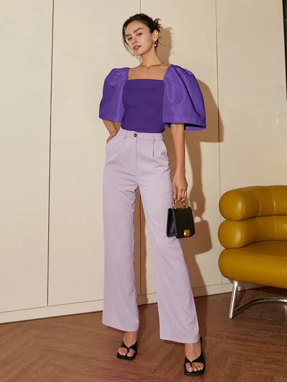 Clara – Elegante camicetta in satin con maniche a sbuffo