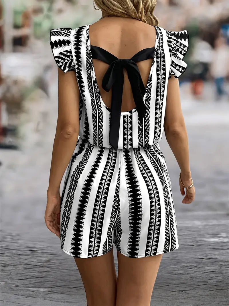 Millicent – Tuta elegante con schiena scoperta