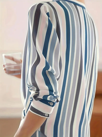 Zyphora – Elegante camicetta a righe con abbottonatura