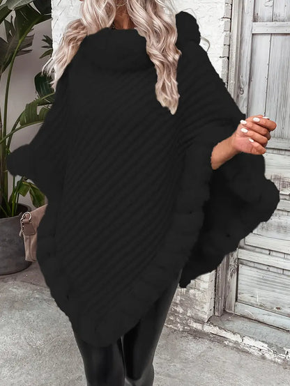 Dahlia – Maglione lavorato a maglia stile poncho