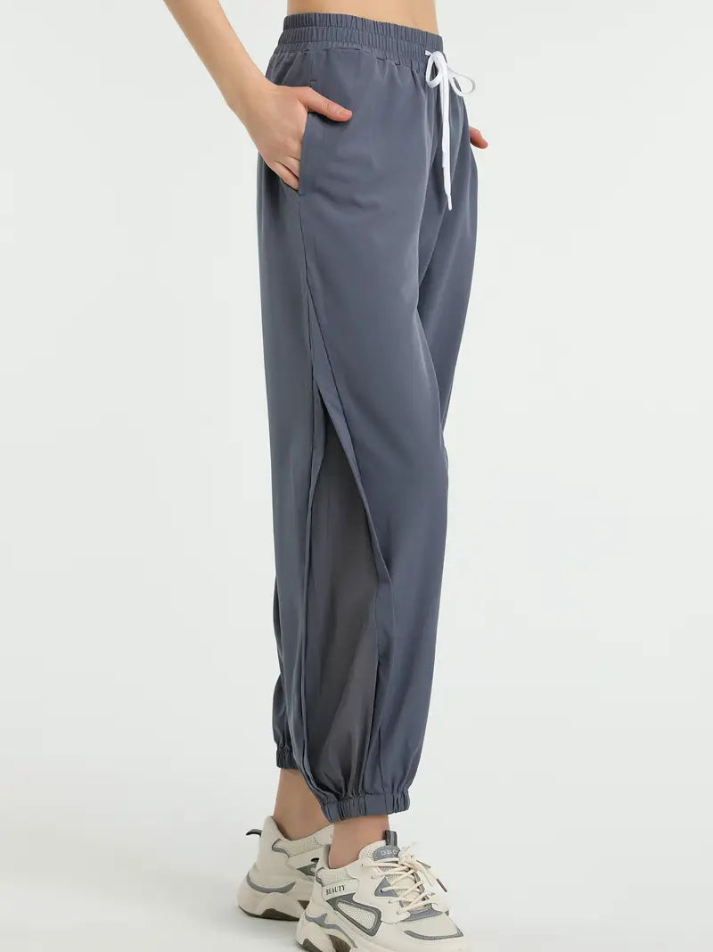 Hexaria – Pantaloni da jogging alla moda con dettagli in rete