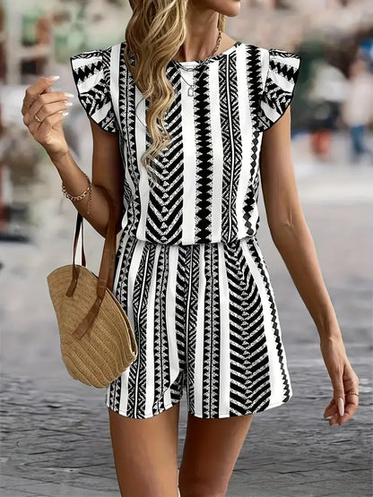 Tara – Tuta alla moda con maniche a cappuccio