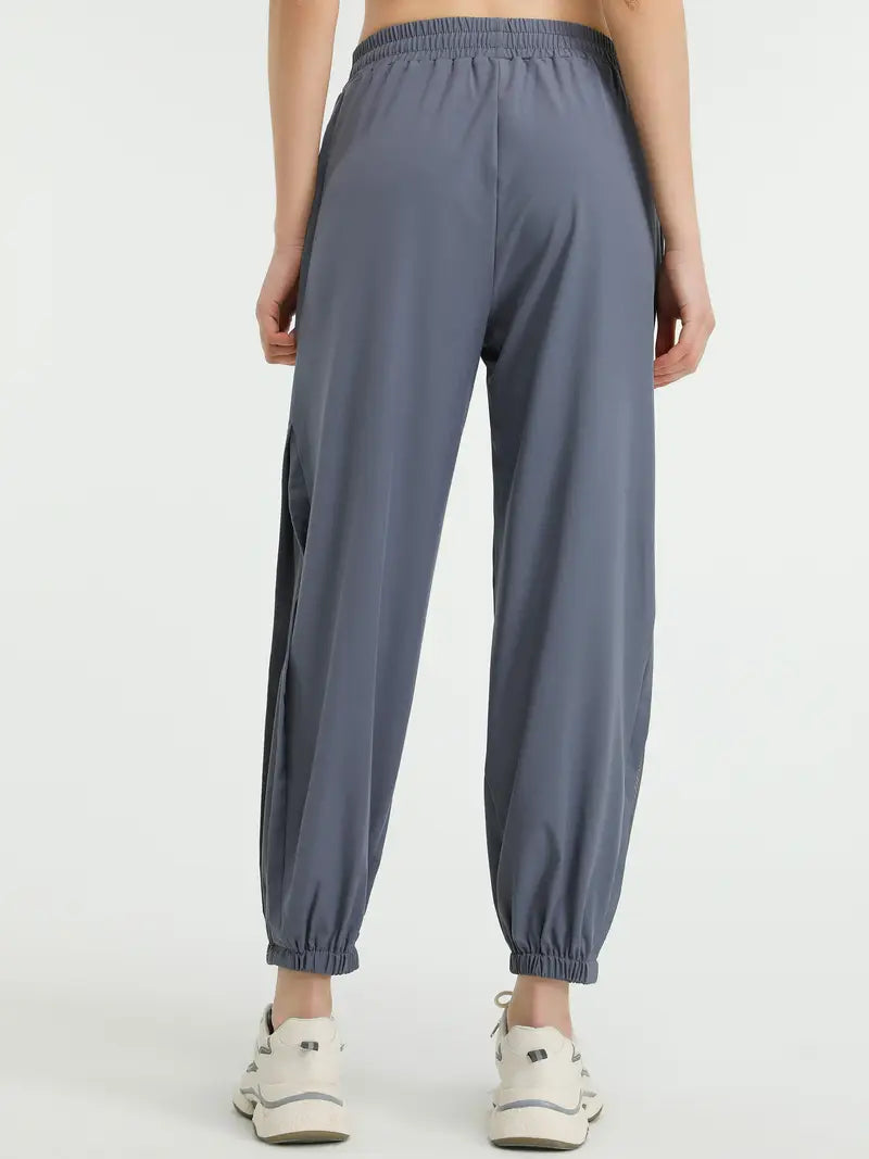 Hexaria – Pantaloni da jogging alla moda con dettagli in rete