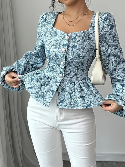 Stella – Blusa elegante con fantasia floreale e maniche a sbuffo