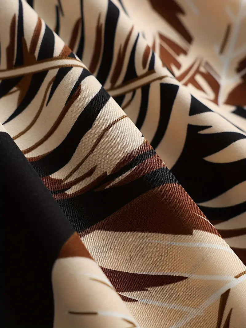 Kamala – Abito a trapezio con spalline sottili e stampa tropicale