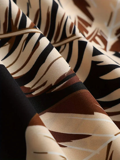 Kamala – Abito a trapezio con spalline sottili e stampa tropicale