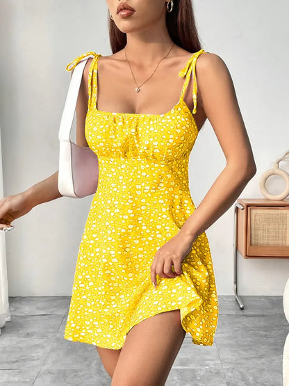 Maxine – Mini abito con motivo floreale e lacci