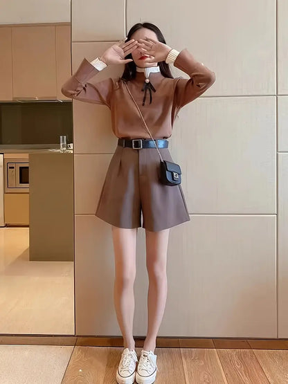 Quinn – Top elegante in cotone con colletto a volant