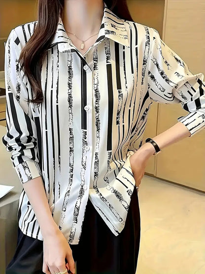 Zyphora – Elegante camicetta a righe con abbottonatura