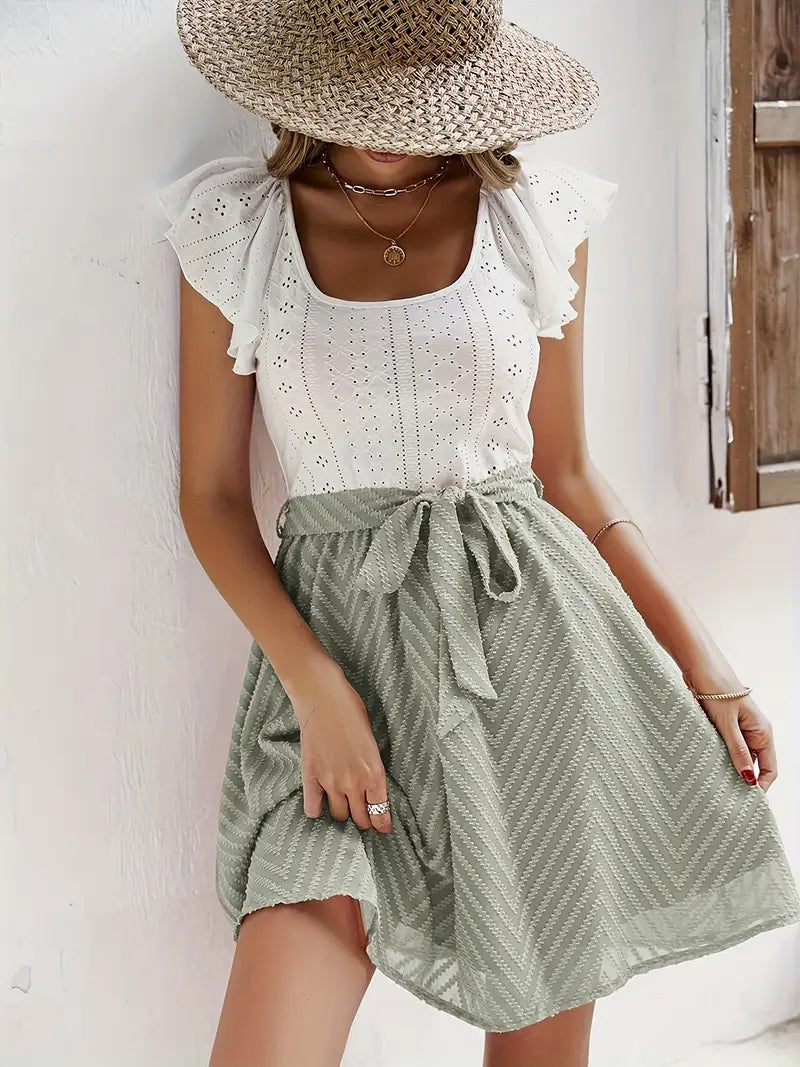 Wilhelmina – Set composto da top con maniche a cappuccio e gonna con cintura