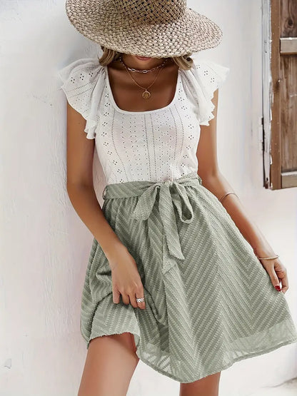 Wilhelmina – Set composto da top con maniche a cappuccio e gonna con cintura