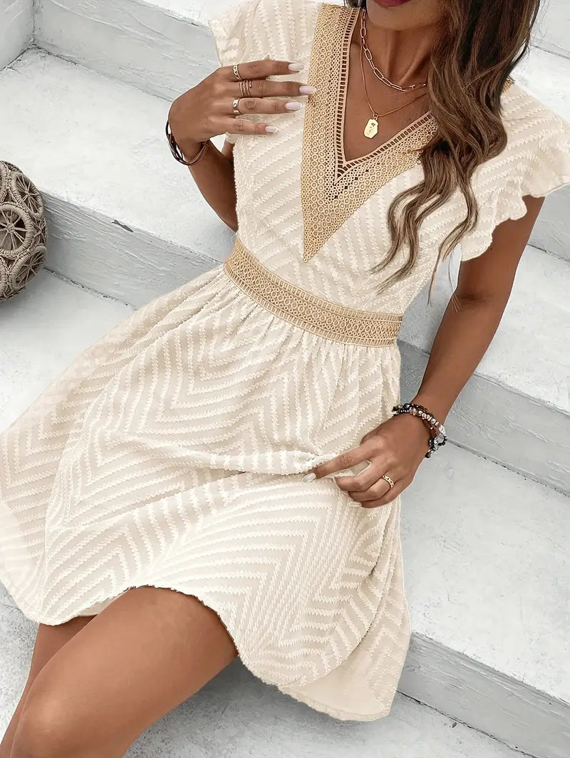 Yoshi – Mini abito boho con scollo a V e struttura