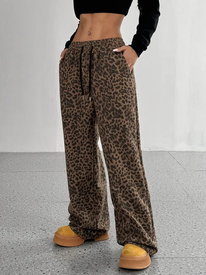 Eryndra – Pantaloni eleganti a gamba larga con stampa leopardata
