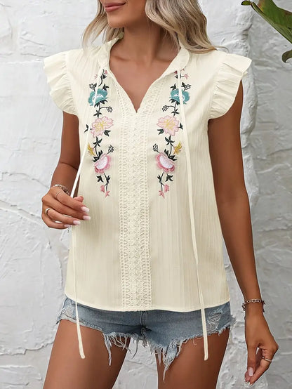 Elysia – Camicetta vintage con maniche a volant ricamate