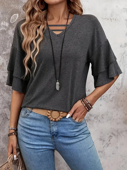 Hesperia – Elegante top con maniche a volant