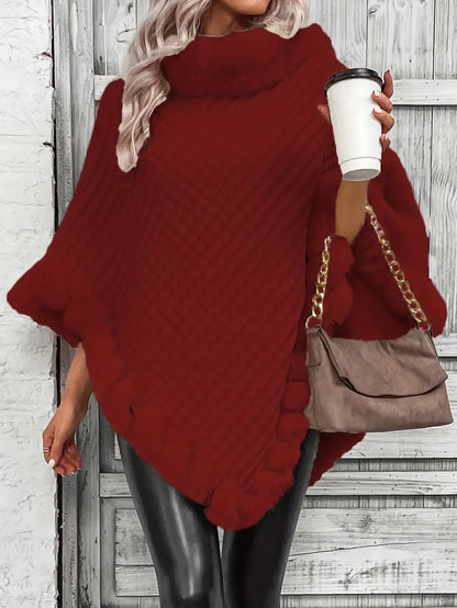 Dahlia – Maglione lavorato a maglia stile poncho