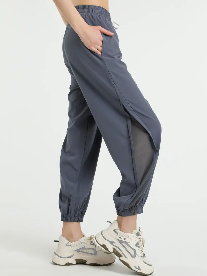 Hexaria – Pantaloni da jogging alla moda con dettagli in rete