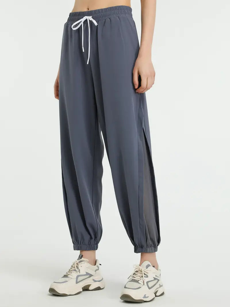 Hexaria – Pantaloni da jogging alla moda con dettagli in rete