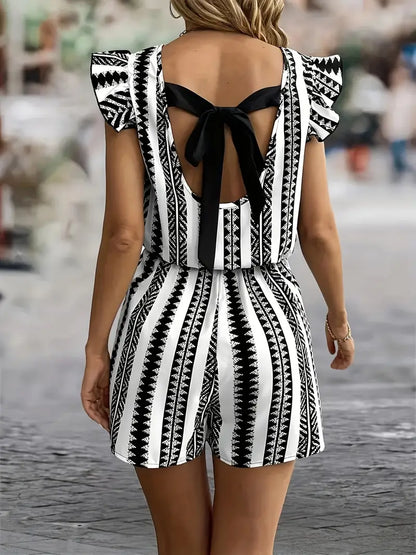 Tara – Tuta alla moda con maniche a cappuccio