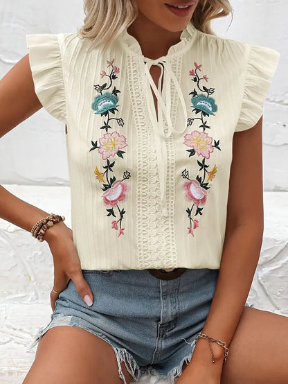 Elysia – Camicetta vintage con maniche a volant ricamate