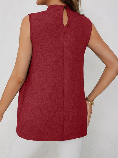 Zyra – Elegante camicetta senza maniche con collo alto