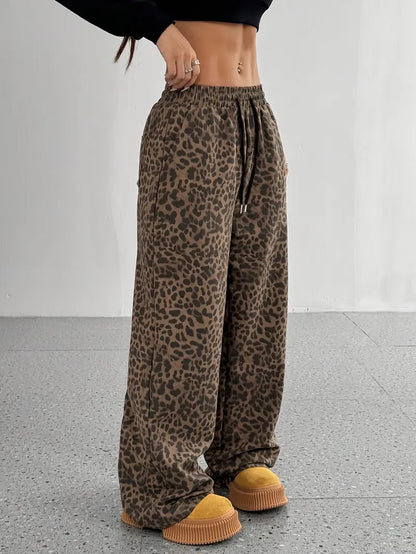 Eryndra – Pantaloni eleganti a gamba larga con stampa leopardata