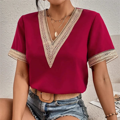 Carryn – Blusa elegante con scollo a V e finiture in pizzo