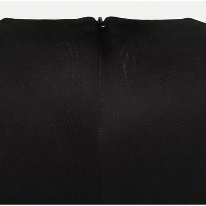 Priyanka – Abito elegante senza maniche con colletto rialzato