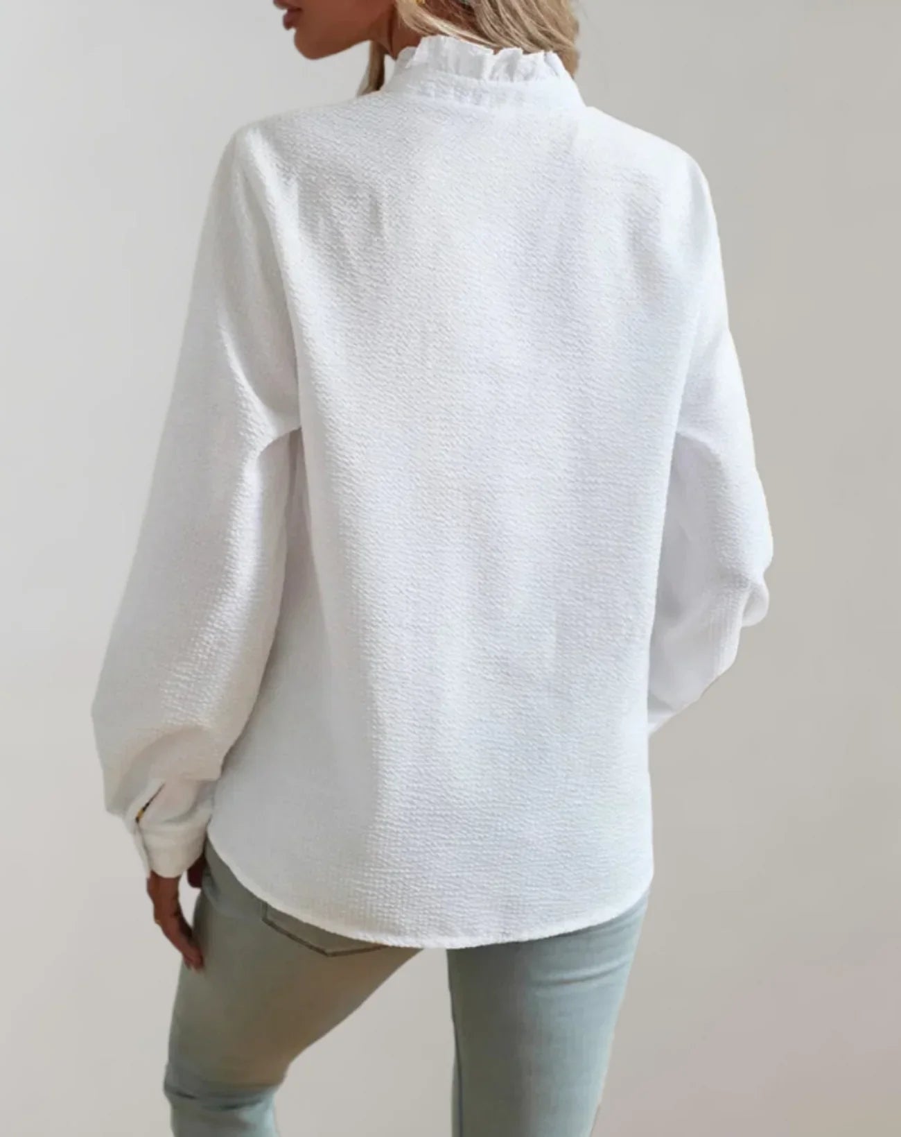 Junia – Blusa elegante con volant e maniche lunghe