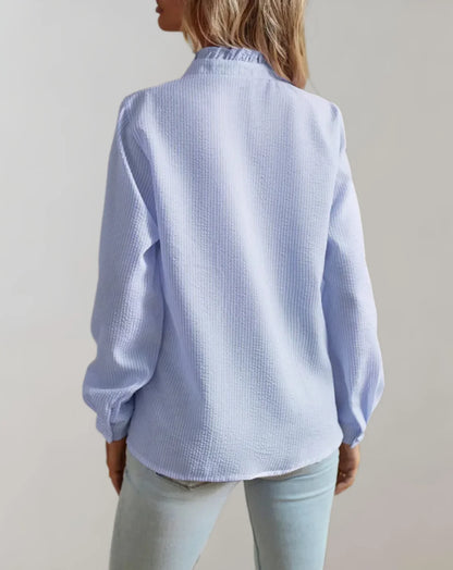 Junia – Blusa elegante con volant e maniche lunghe