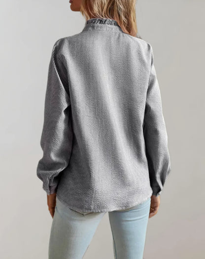 Junia – Blusa elegante con volant e maniche lunghe