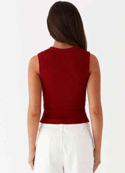 Zyrah – Elegante top senza maniche realizzato in maglia a coste