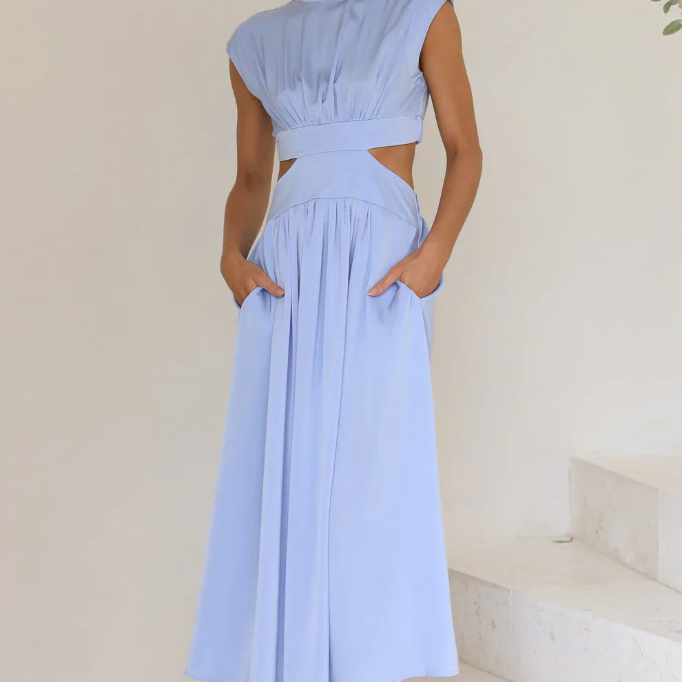 Aztrid – Elegante abito midi con ritagli e tasche