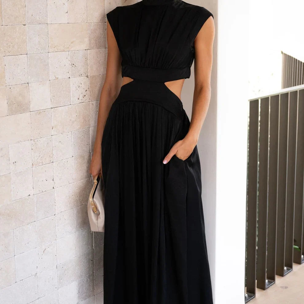 Aztrid – Elegante abito midi con ritagli e tasche