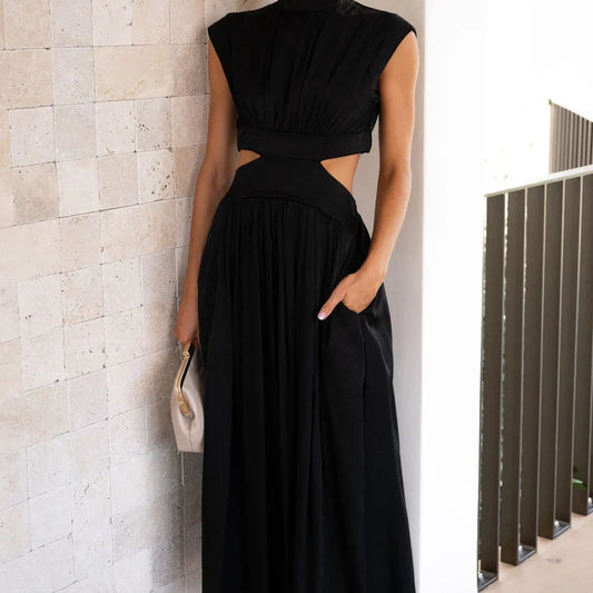 Aztrid – Elegante abito midi con ritagli e tasche