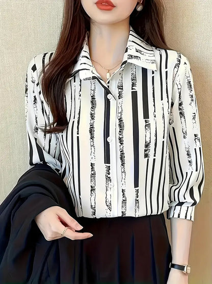 Zyphora – Elegante camicetta a righe con abbottonatura