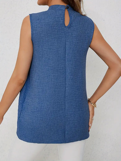 Zyra – Elegante camicetta senza maniche con collo alto