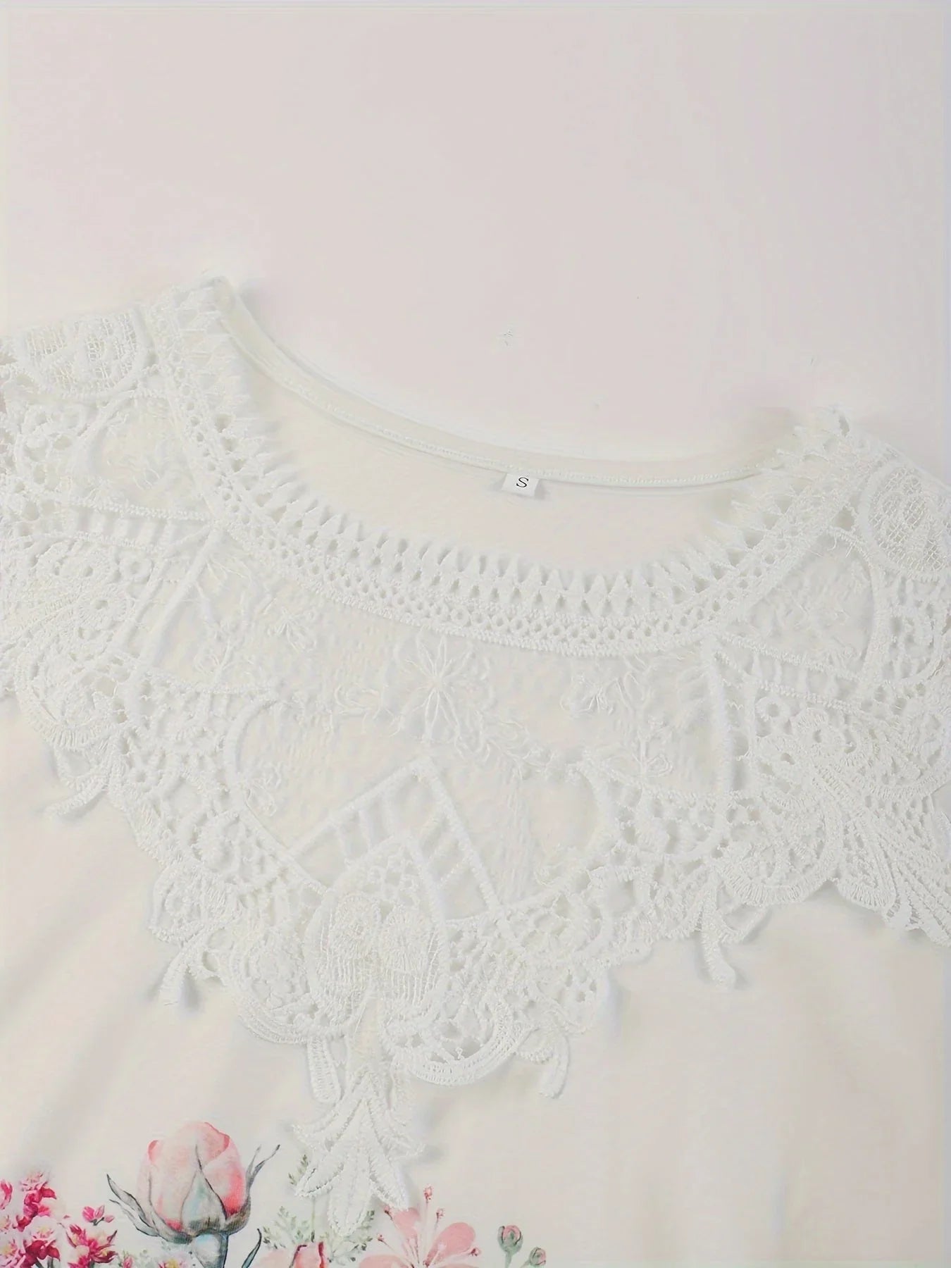 Britten – Blusa elegante realizzata in pizzo floreale